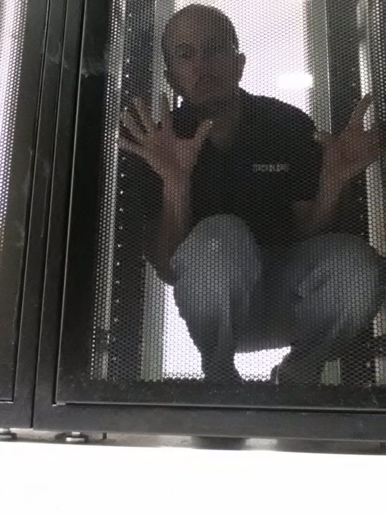 Josh trapped in a Network Rack Enclosure